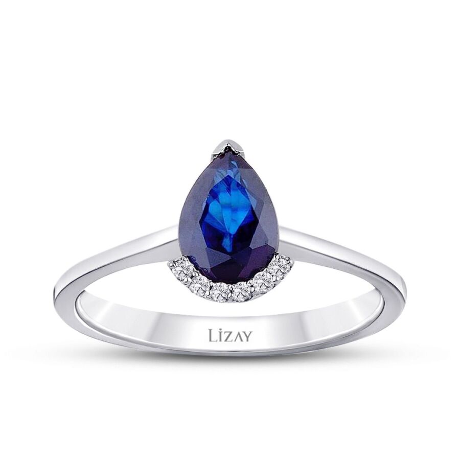 0.84 Carat Diamond Pear Sapphire Ring