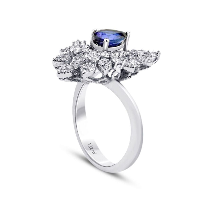 1,28 Carat Diamond Pear Sapphire Ring
