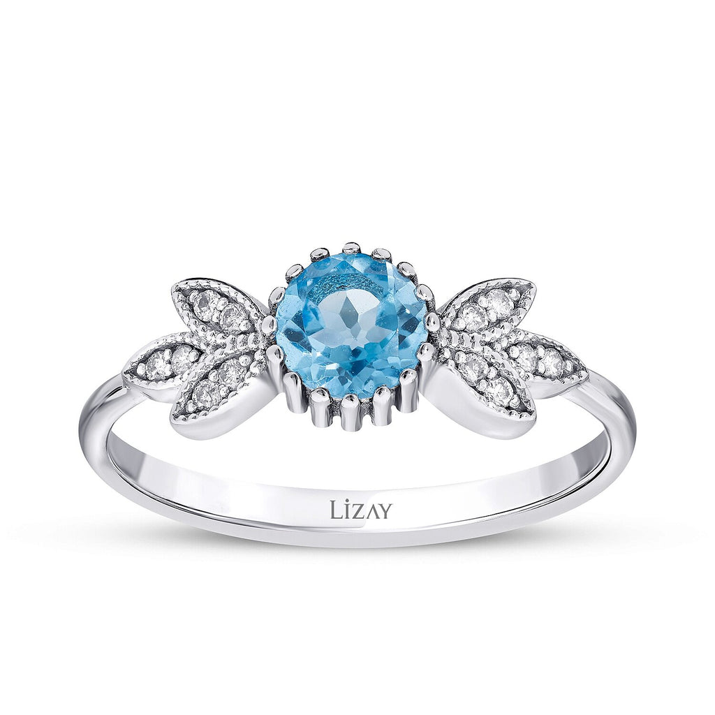 0,63 Carat Diamond Blue Topaz Ring