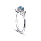 0,63 Carat Diamond Blue Topaz Ring