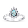 0.57 Carat Diamond Pear Blue Topaz Ring