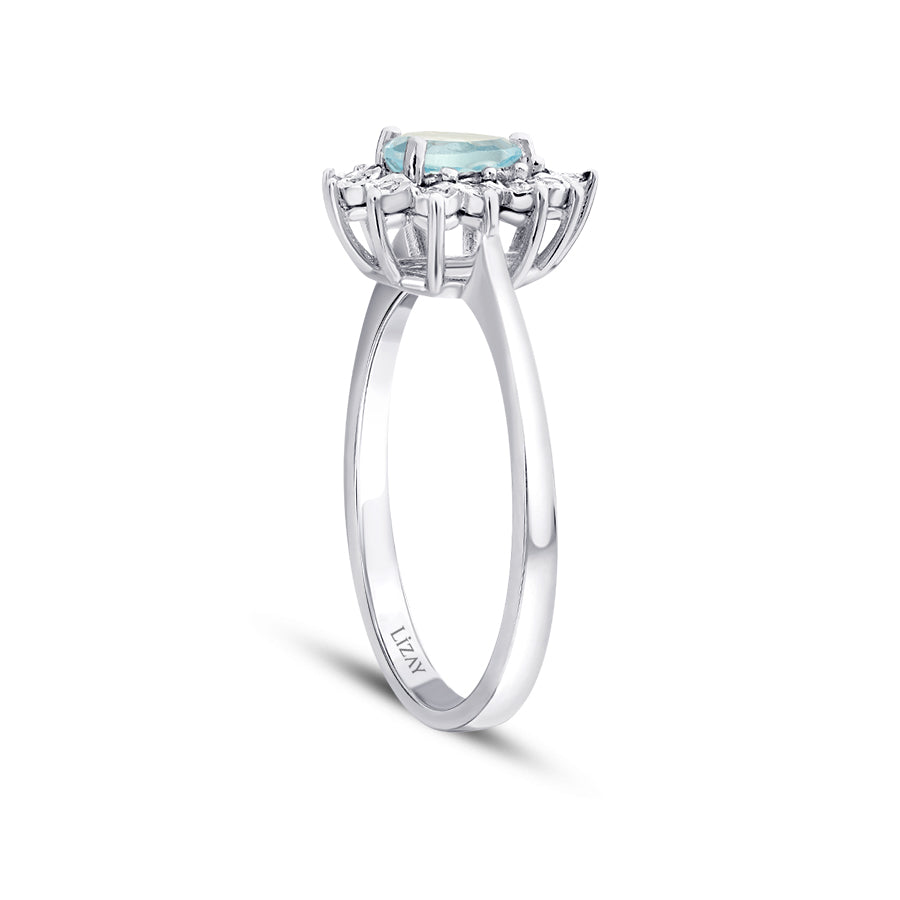 0.57 Carat Diamond Pear Blue Topaz Ring