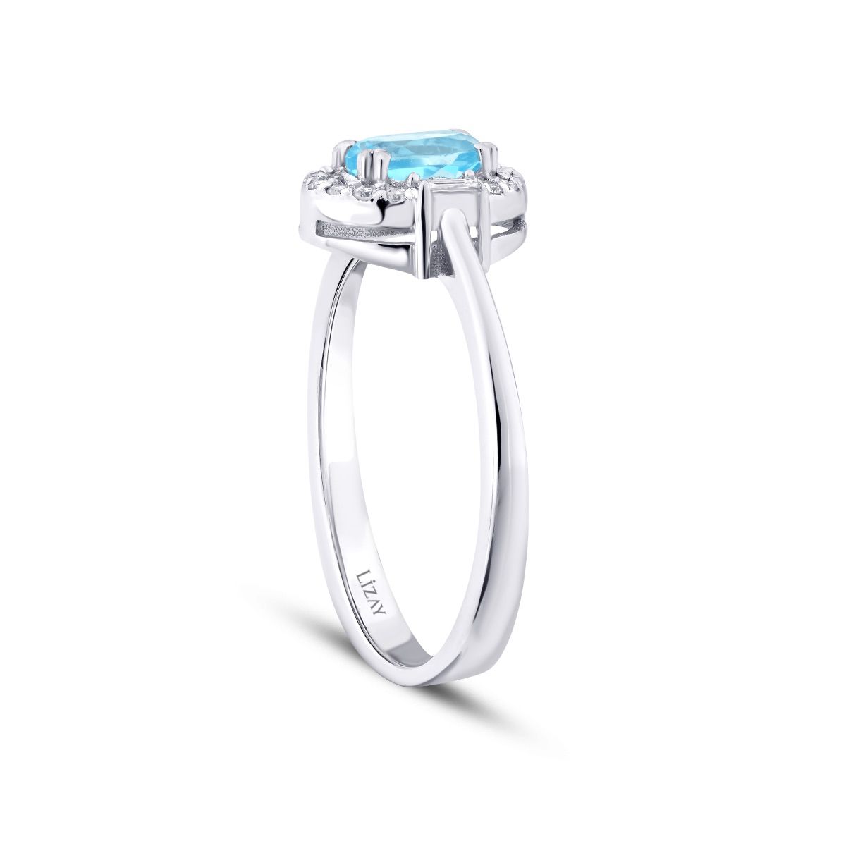 0.67 Carat Diamond Blue Topaz Baguette Ring