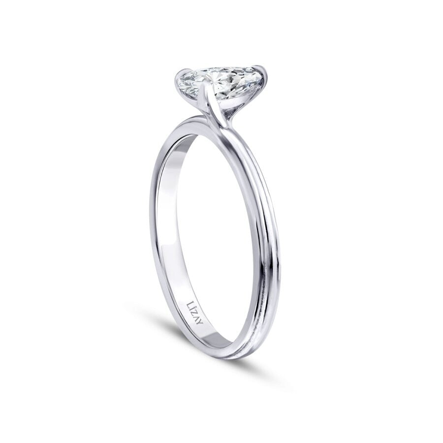 0.60 Carat Diamond Pear Solitaire Engagement Ring